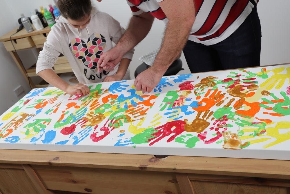 kids painting hands